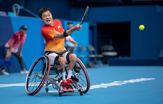 Japanese wheelchair tennis player Shingo Kunieda hitting a forehand during a match in Tokyo