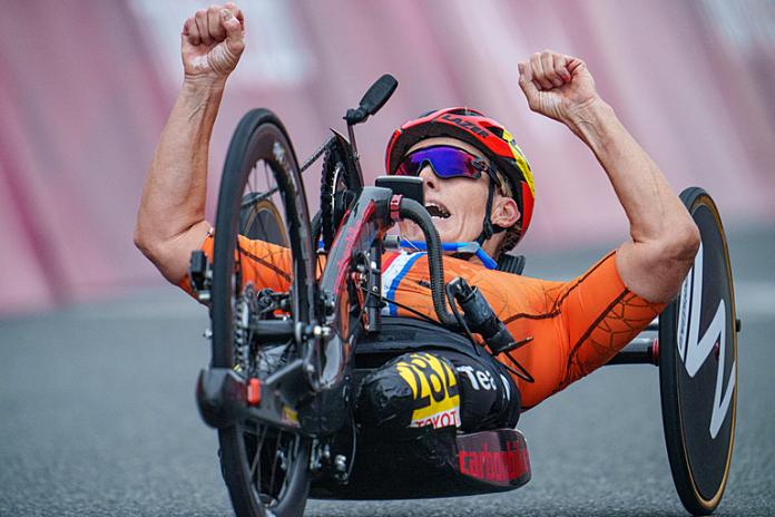 Dutch female handcyclist celebrates