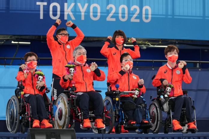 (L-R) Yuriko Fujii, Takayuku Hirose, Takumi Nakamura, and Hidetaka Sugimura of Team Japan after winning the bronze medal in Boccia Team BC1/BC2 at the Tokyo 2020 Games. 