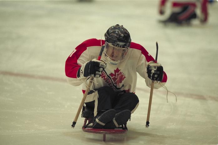 Canadian Para ice hockey player on the rink at Lillehammer 1994