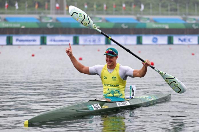 Australia's Curtis McGrath celebrates his gold in the Canoe Sprint Men's Kayak Single 200m at the Tokyo 2020 Paralympic Games. 