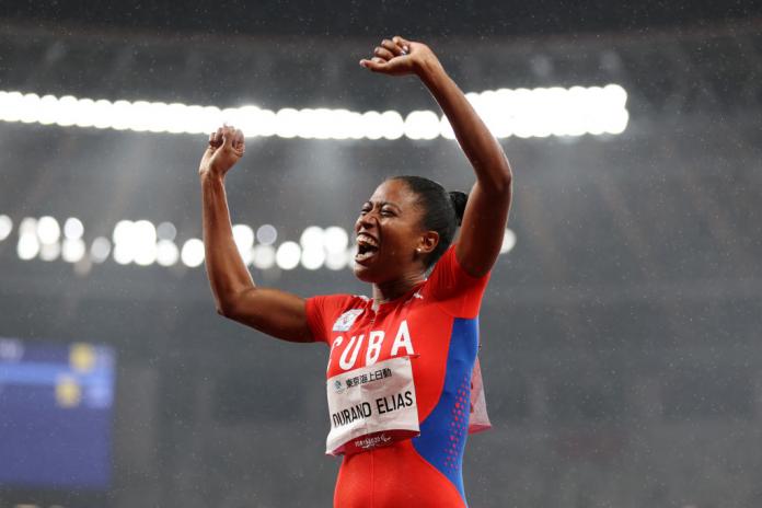 Cuban Omara Durand Elias celebrates her world record gold in the women's 200m T12 at the Tokyo 2020 Paralympic Games.