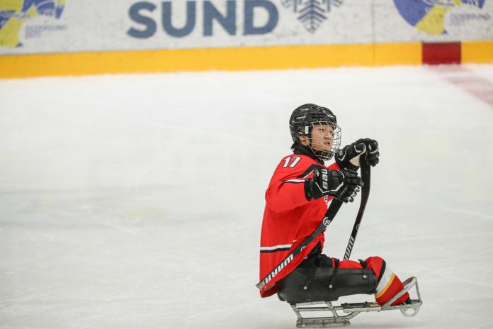 Chinese Para Ice Hockey player Yi Feng Shen in action