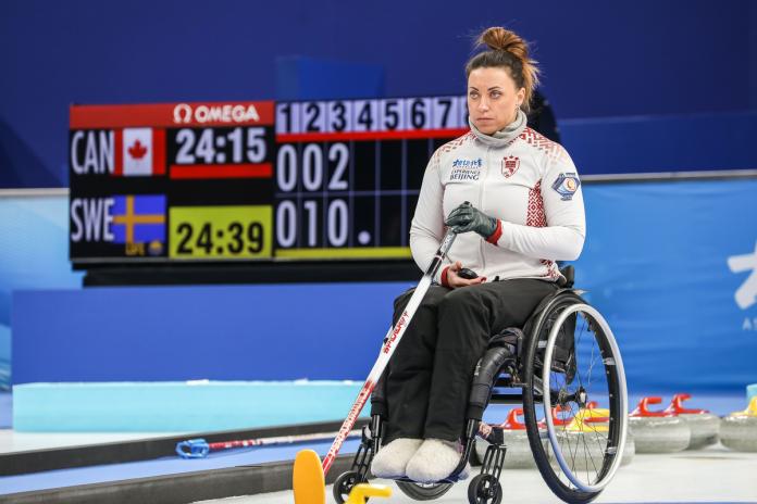 Latvia's wheelchair curler Polina Rozkova in action