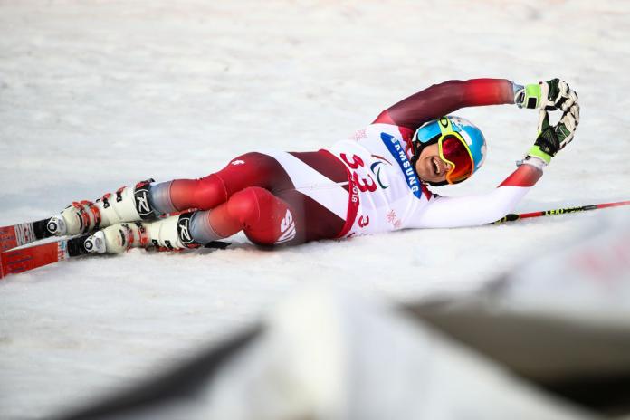 Gold Medallist Theo Gmur of Switzerland celebrates winning the Men's Giant Slalom Run Standing at the PyeongChang 2018.