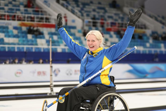 Swedish wheelchair curler Kristina Ulander celebrates
