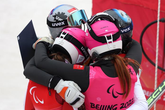 Gold medalist Veronika Aigner and Bronze medalist Barbara Aigner react after the giant slalom competition