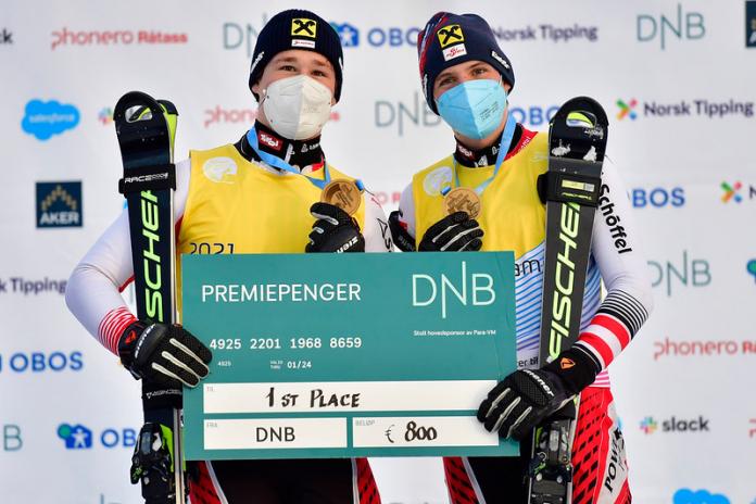 Johannes Aigner celebrates on the Lillehammer 2021 podium