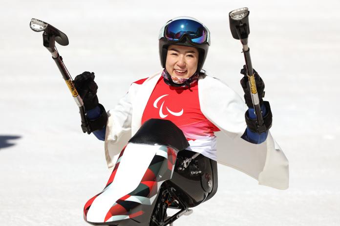 Momoka Muraoka smiles following her Beijing 2022 downhill victory