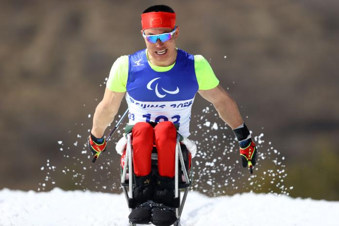 Zhongwu Mao of China competes in the Men's Middle Distance Sitting at the Beijing 2022 Paralympic Winter Games at Zhangjiakou National Biathlon Centre.