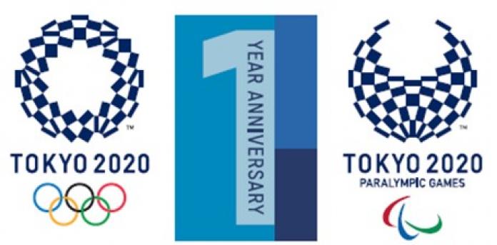 The emblems of the Tokyo 2020 Olympic and Paralympic Games are displayed on both sides of a blue block displaying the number one with the words "year anniversary" written on top.