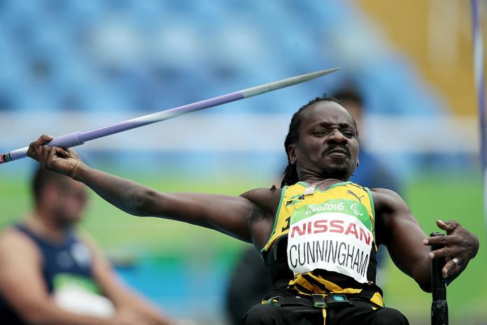Alphanso Cunningham prepares to throw the javelin, a look of concentration and effort on his face, during competition at the Rio 2016 Paralympic Games.