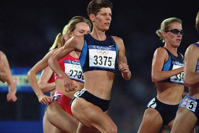 A woman runs as part of the pack in the 1500m race at the Sydney 2000 Olympic Games.