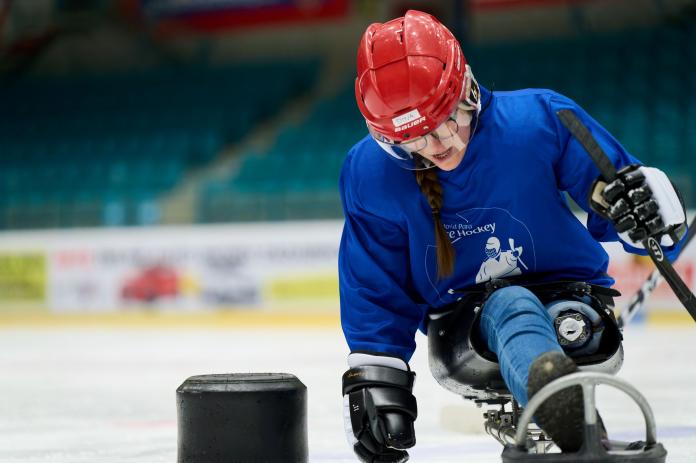 A female Para ice hockey trains during a development camp.