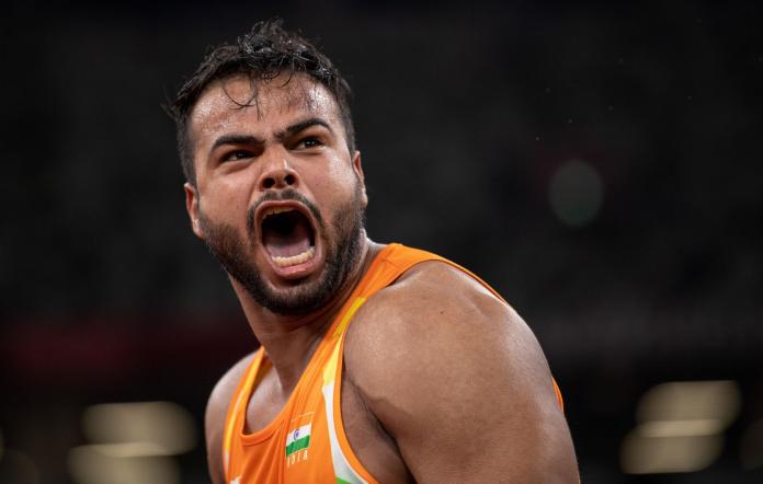 A close-up of a male Indian athlete reacting during his event at the Tokyo 2020 Paralympic Games.