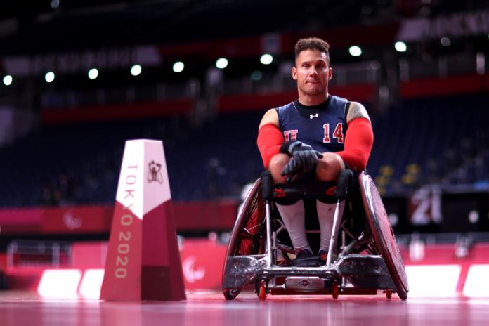 A male wheelchair rugby player is on the court during training ahead of the Tokyo 2020 Paralympic Games