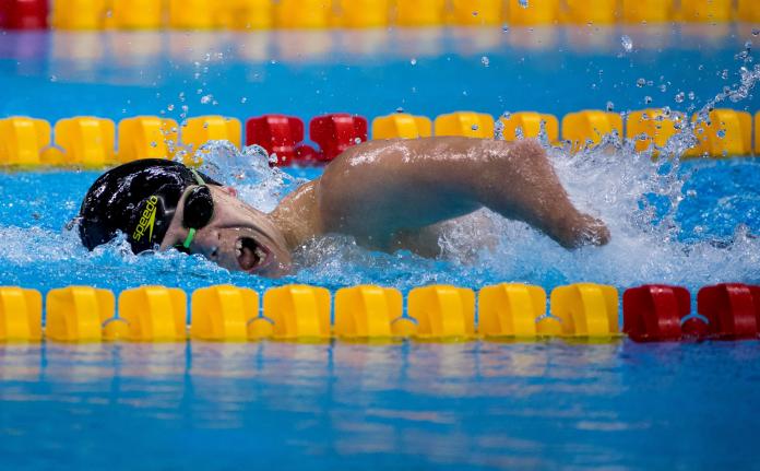 A male Para swimmer breathes while competing at the Rio 2016 Paralympic Games