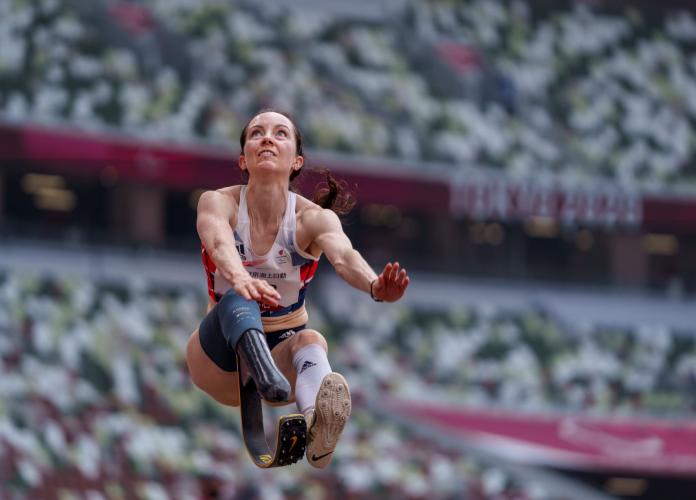A female athlete with a prosthetic leg competes in long jump at Tokyo 2020