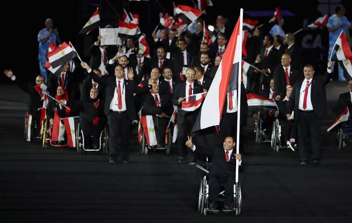 A group of more than 30 athletes carrying Egypt's flag parade during the Rio 2016 Opening Ceremony