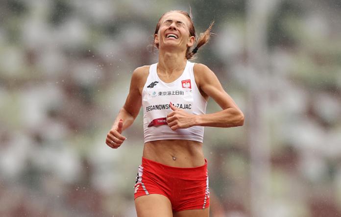 A female runner competes at Tokyo 2020.