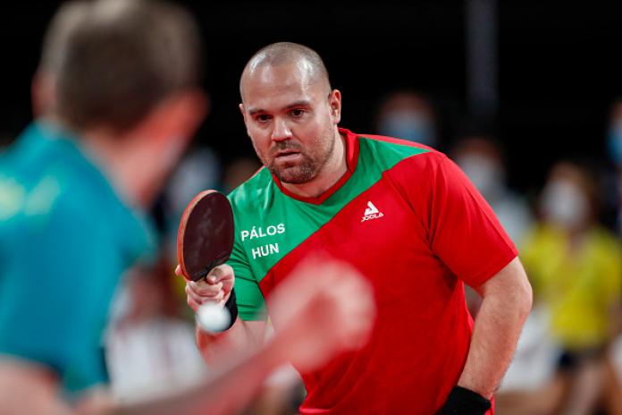 A male table tennis player competes at Tokyo 2020.