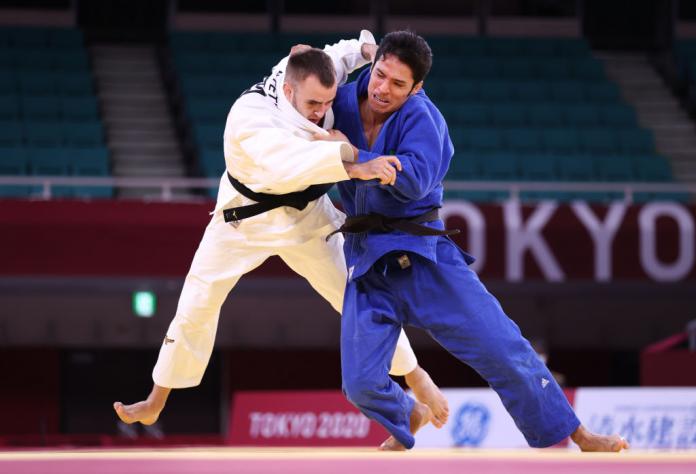 Two male Para judokas fighting on the mat