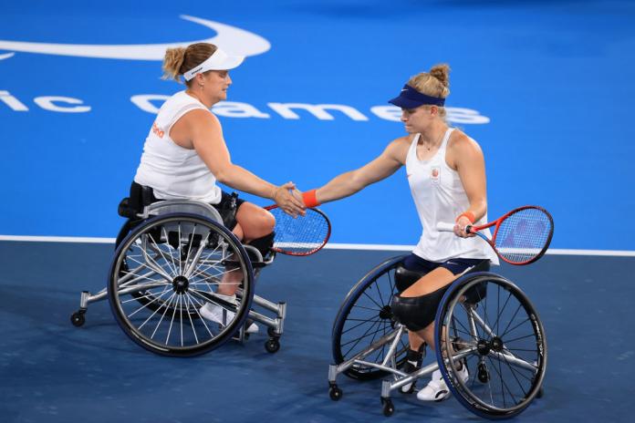 Diede de Groot Aniek van Koot give a high five on the court