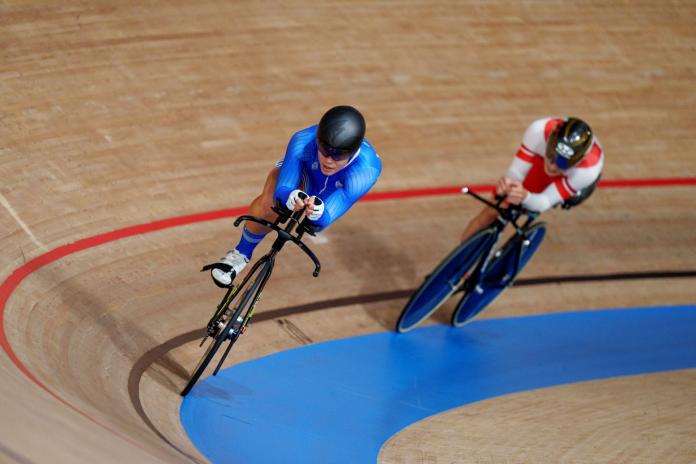 Two male Para cyclists compete