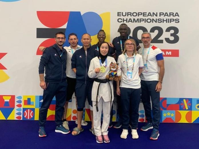 A group photo of male and female Para taekwondo athletes and officials