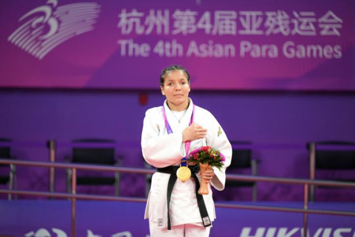 A female athlete on the podium