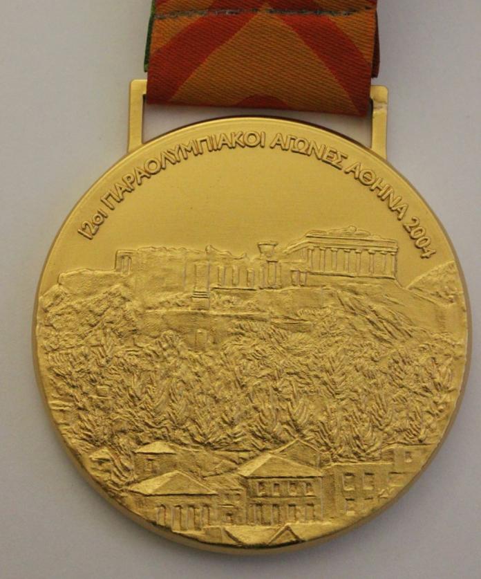 Photo shows the front side of the Athens 2004 gold medal