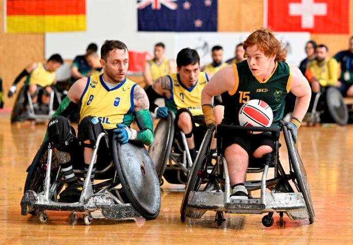 Wheelchair rugby players in action at the Paris 2024 Qualification event in New Zealand.
