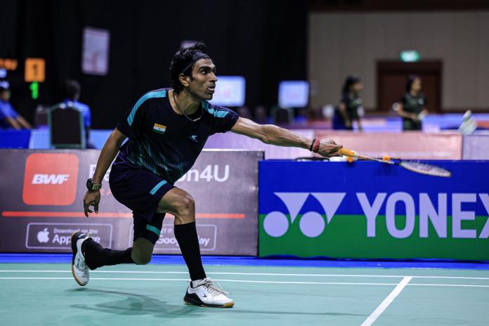 A male Para badminton player in action at the 2024 World Championships.