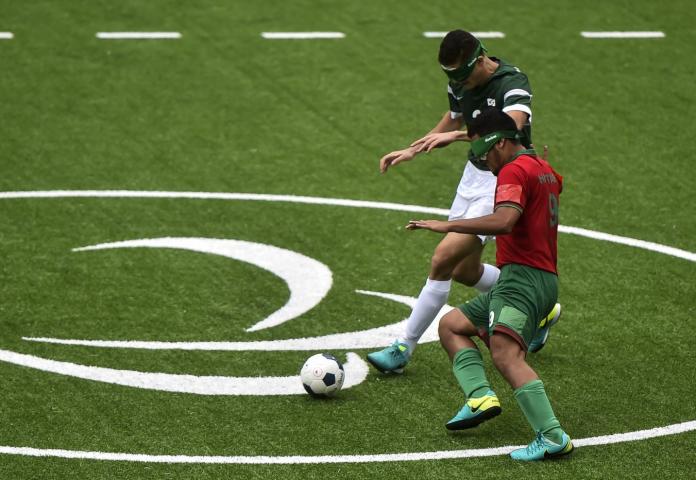 Two male players in action.