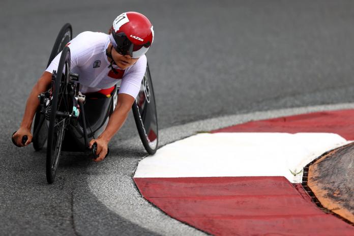 Bianbian Sun, a Para cyclist from China, competes in a handcycle.