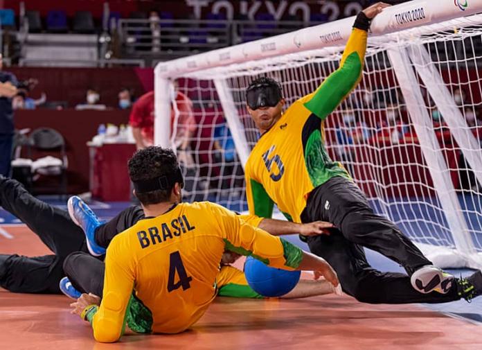 Josemarcio Sousa blocks the ball in front of the net 