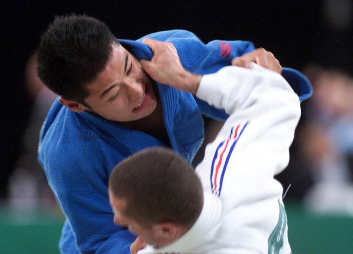 Male Para judo athletes in action at Sydney 2000