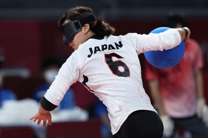 Goalball player Norika Hagiwara of Japan prepares to throw a ball during competition