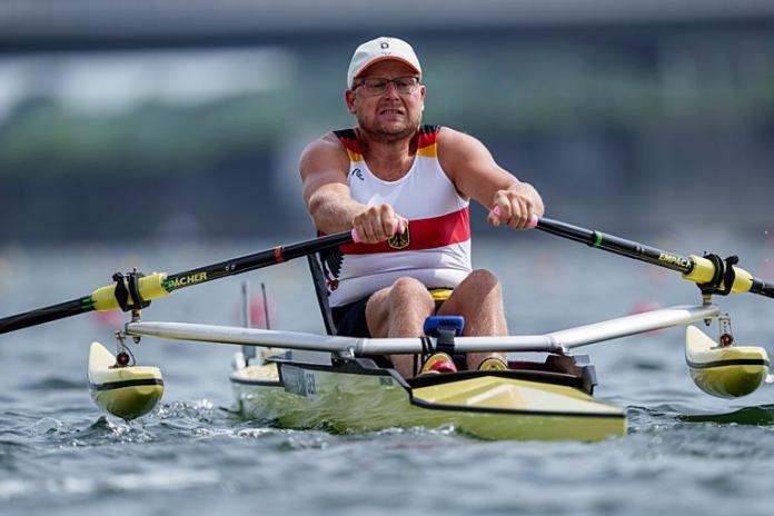 A male Para rower in action at the Tokyo 2020 Paralympics