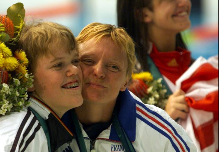Beatrice Hess and Maria Goetze pose for a photograph together.