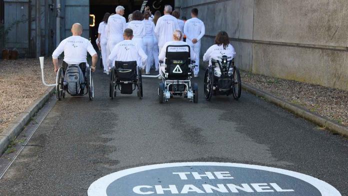 a group of Para athletes journeying into the Channel Tunnel 