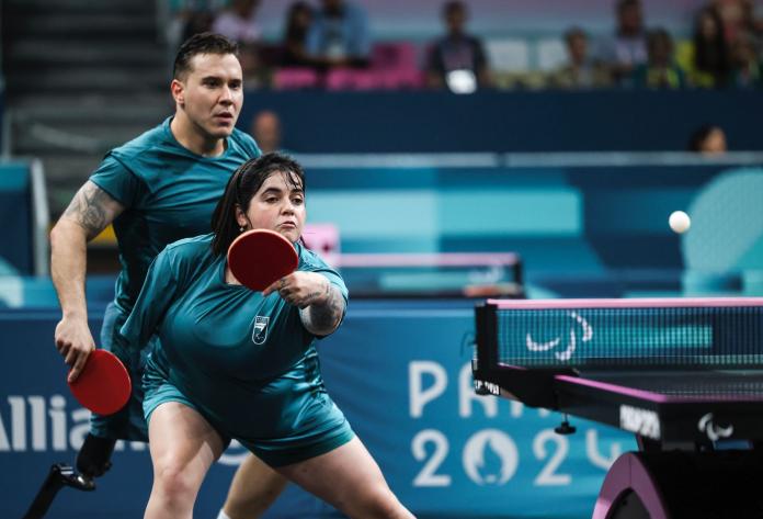 Para table tennis player Bruna Alexandre playing a backhand 