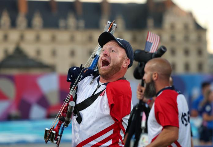Para archer Matt Stuzman screams in delight after winning gold