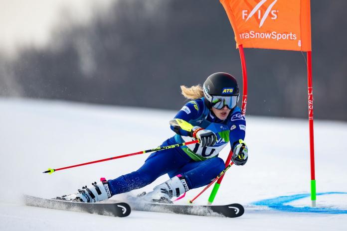A female Para alpine skier in action