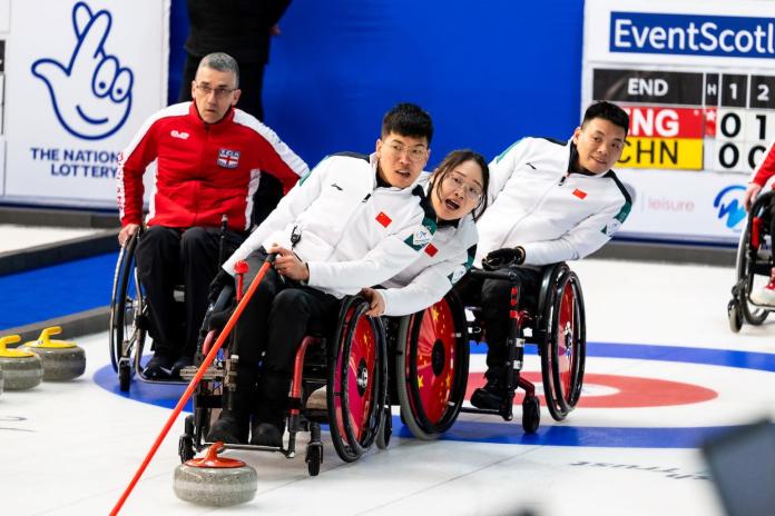 Three Chinese wheelchair curling athletes are competing. 