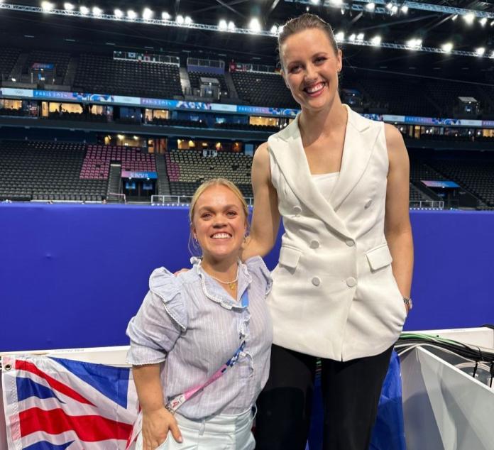 Ellie Simmonds and Ellie Cole pose for a photograph in the mixed zone at Paris 2024