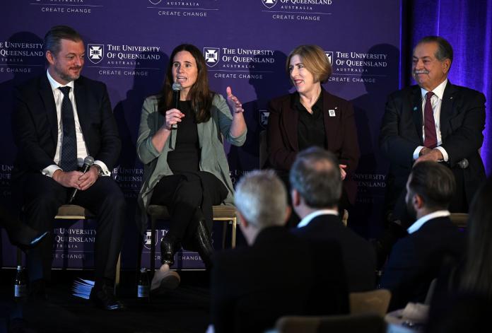 Four people taking part in a panel discussion
