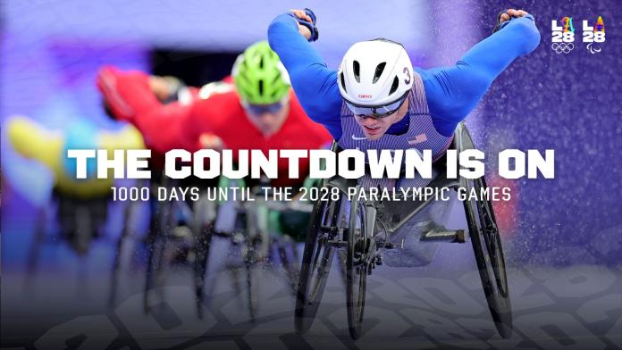 A graphic featuring a USA wheelchair racing athlete in competition, with the words "The Countdown is on 1000 days until the 2028 Paralympic Games" 