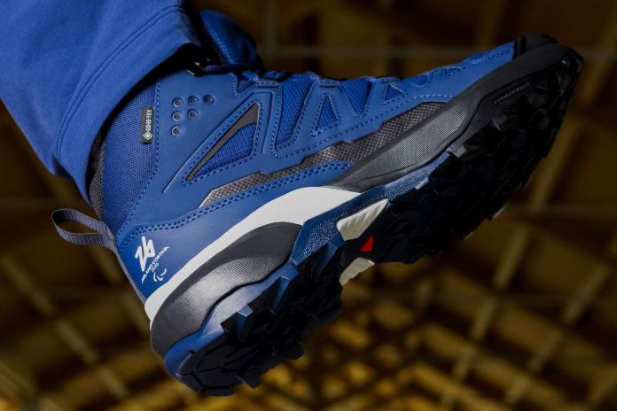 Blue boots with the logo of the Milano Cortina 2026 Paralympic Winter Games