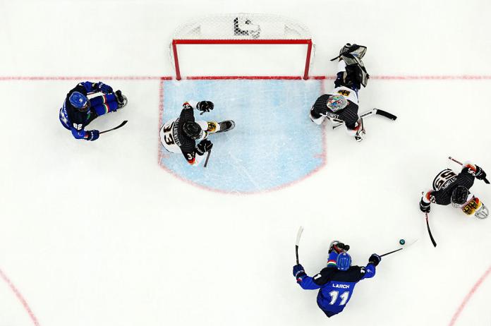 An aerial shot of an Italy-Germany Para ice hockey game